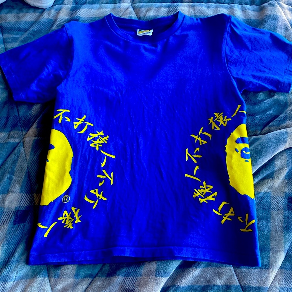 Blue and yellow BAPE shirt with japanese writing